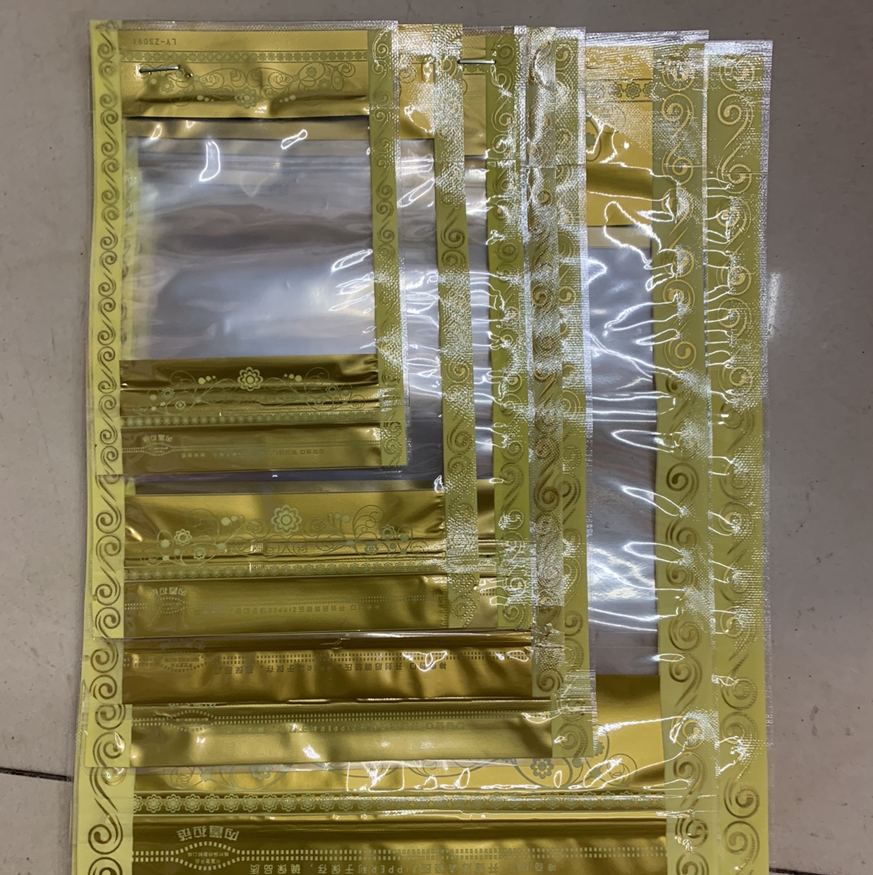 Golden lace composite self-standing bone bag 20*28