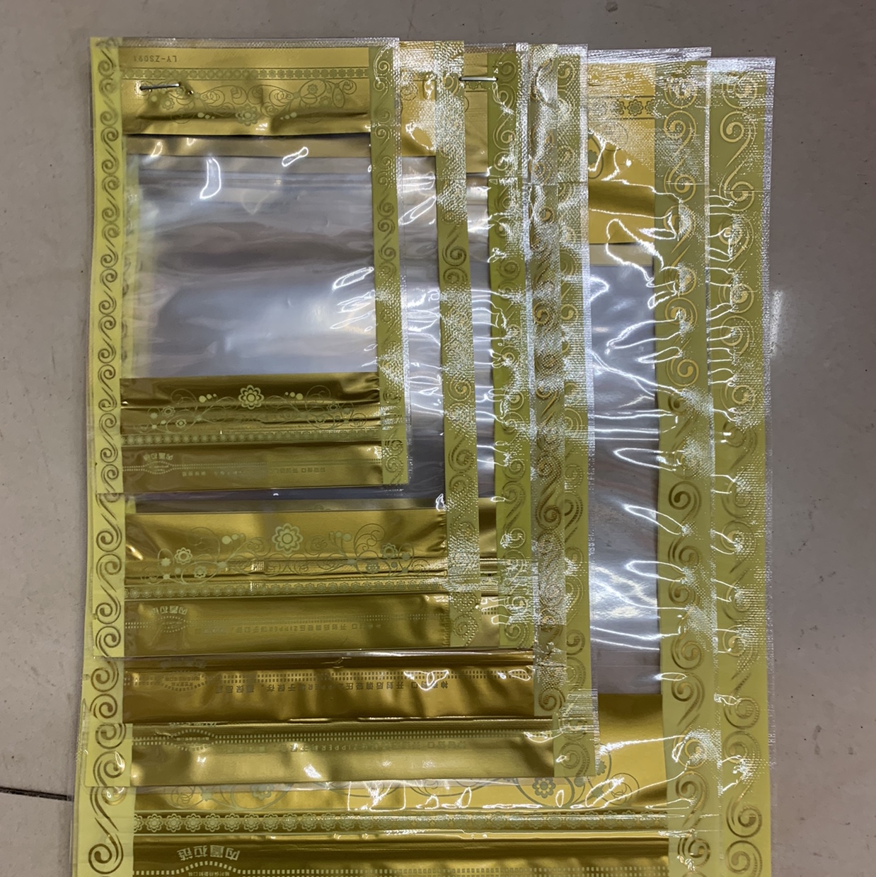 Golden lace composite self-standing bone bag 15*22