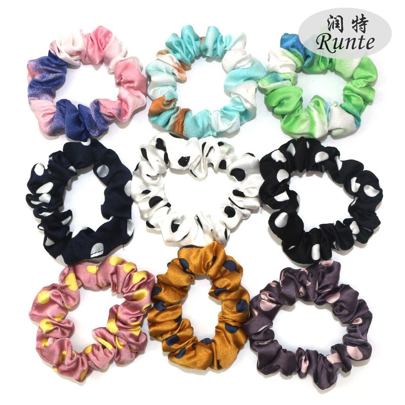Wholesale of cross-border fashion and creative polka dot hair bands, European and American large intestine bands, fabric hair accessories and headbands from manufacturers detail image 1