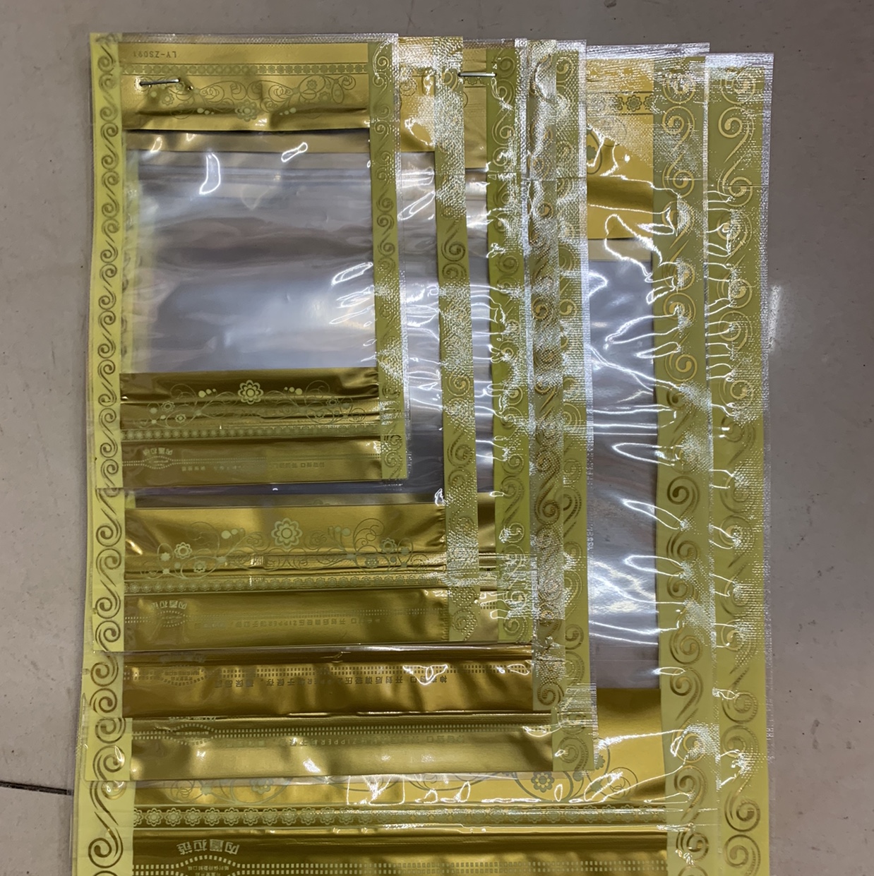 Golden lace composite self-standing bone bag 22*30