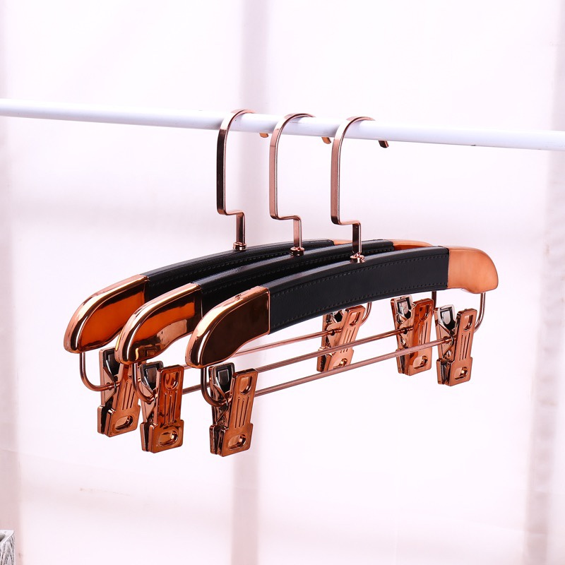 Clothing store leather unmarked gold adult hangers for men and women for children details Picture