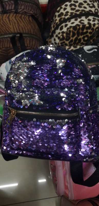A shiny purple backpack