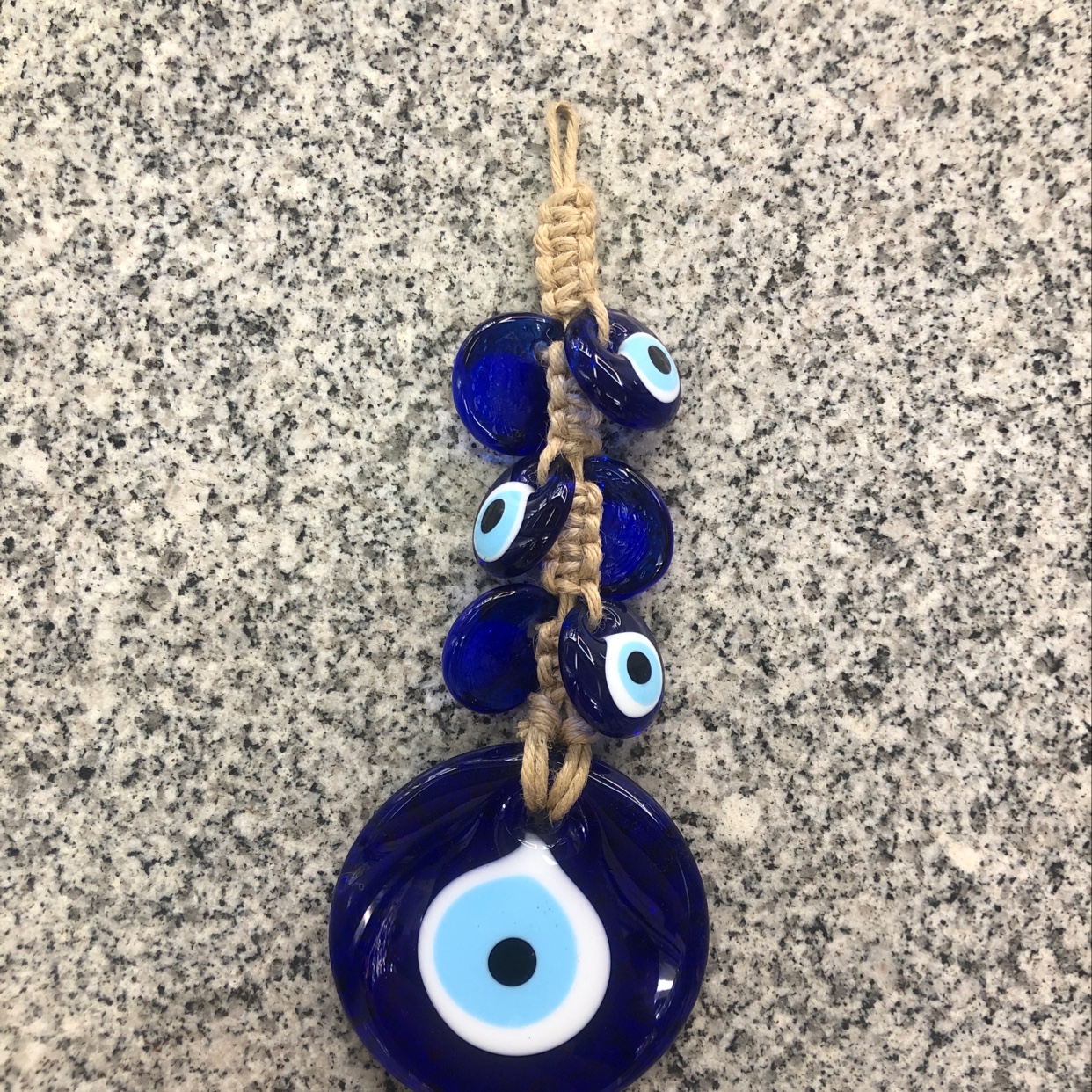 Blue eye pendant made of hemp rope