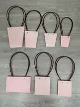 粉红鲜花包装袋，教师节礼品袋