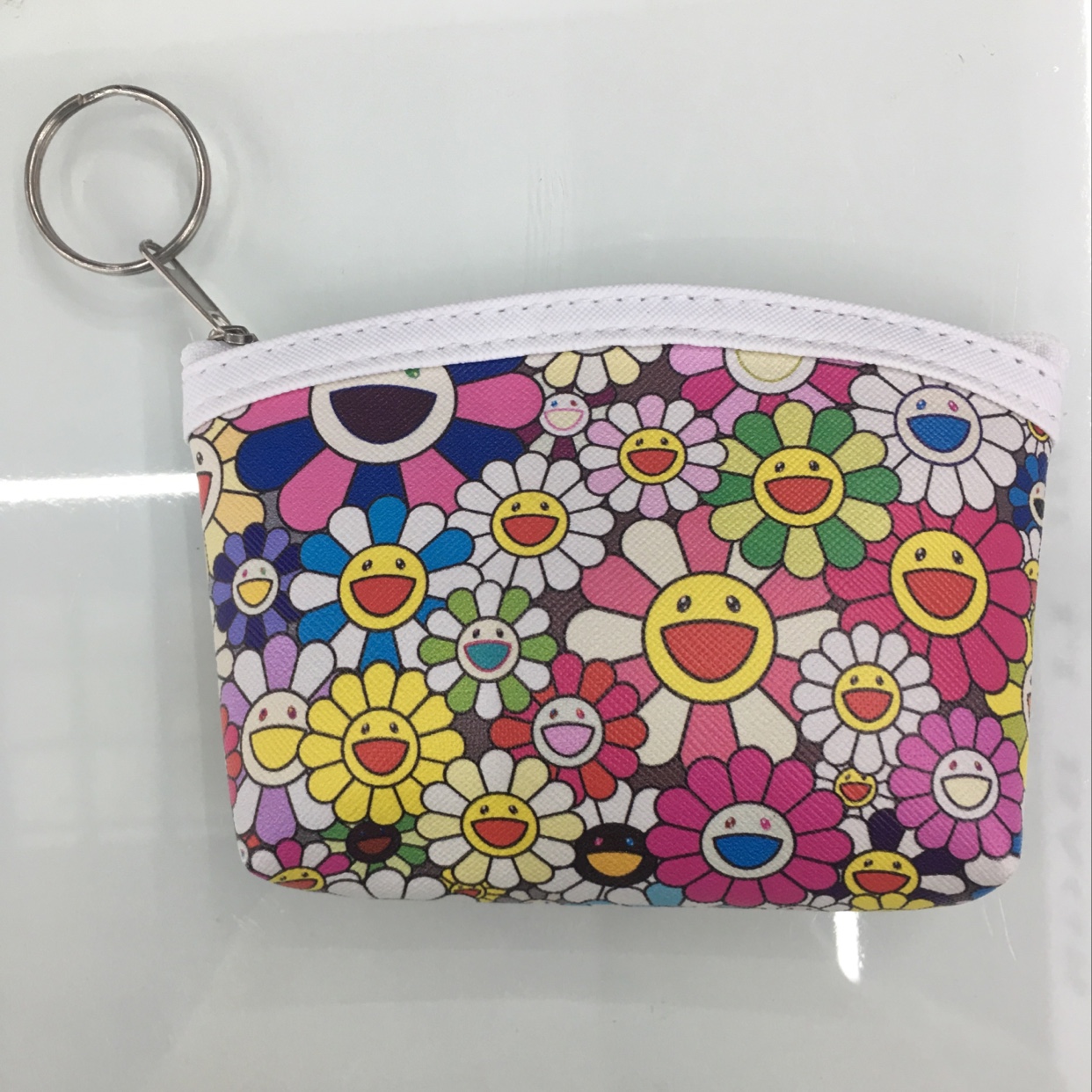 PU数码印花包边太阳花零钱包产品图