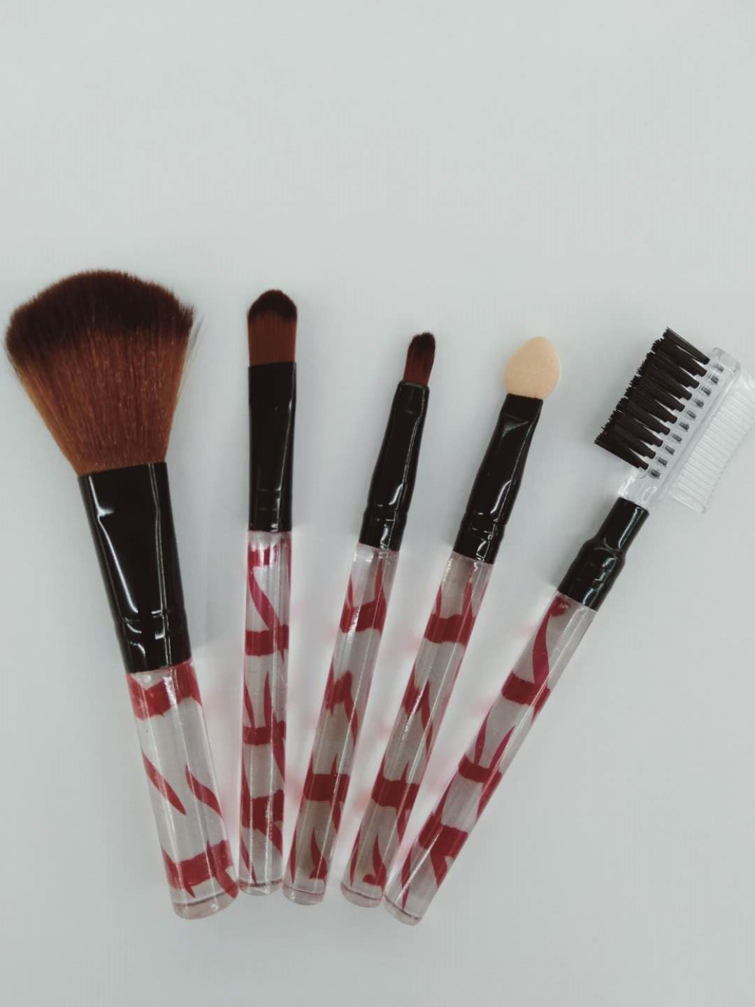 Makeup tools: brush, eyebrow brush, flame brush