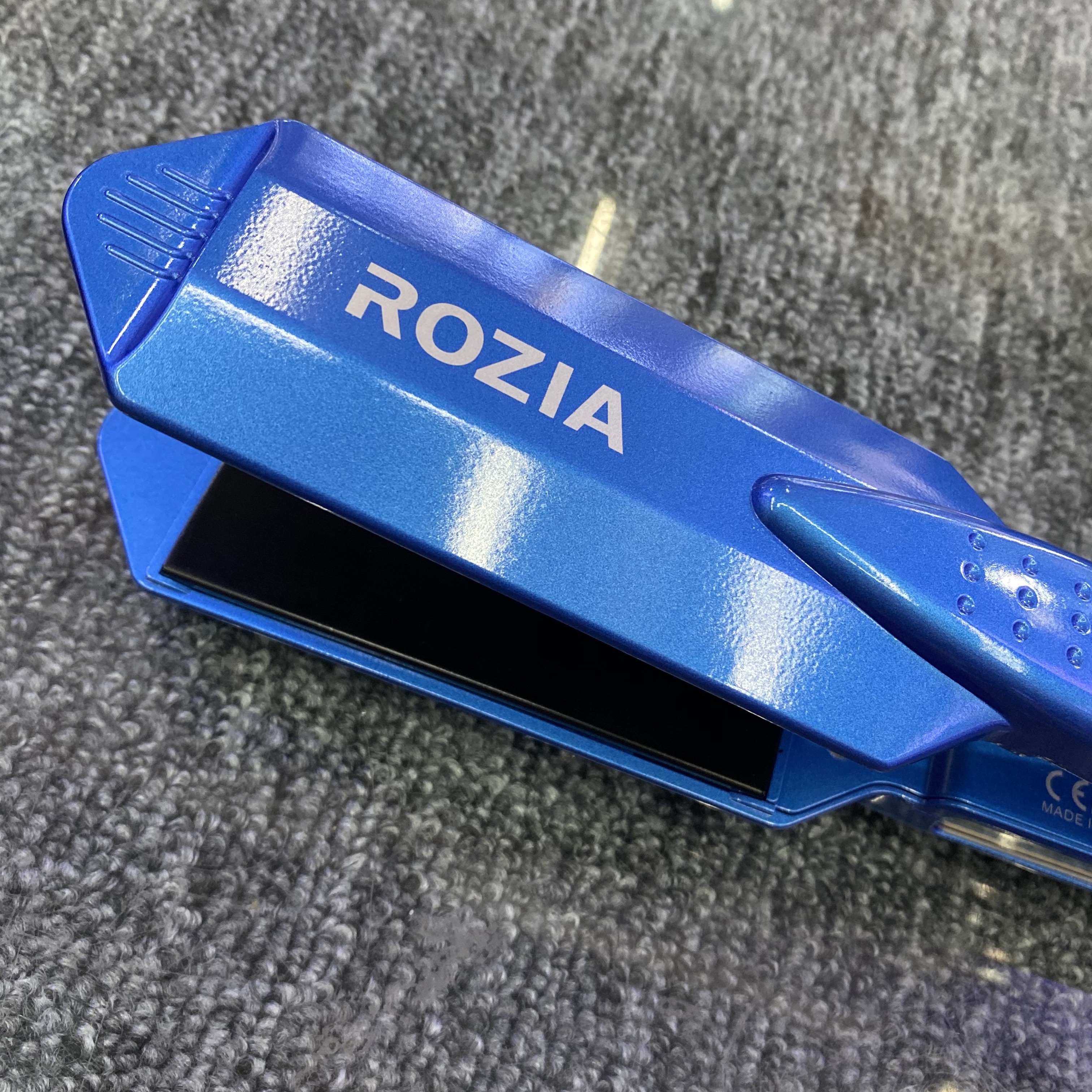 The adjustable temperature range of the Rozia lady's straight plate clamp shows HR745 details Picture