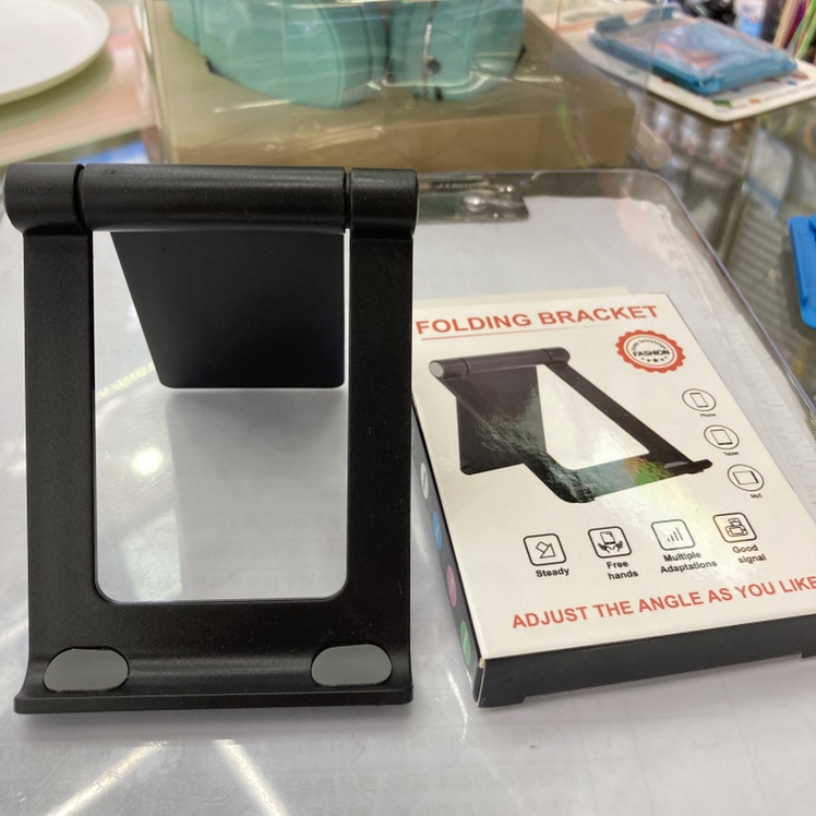 A hollowed-out design foldable phone stand
