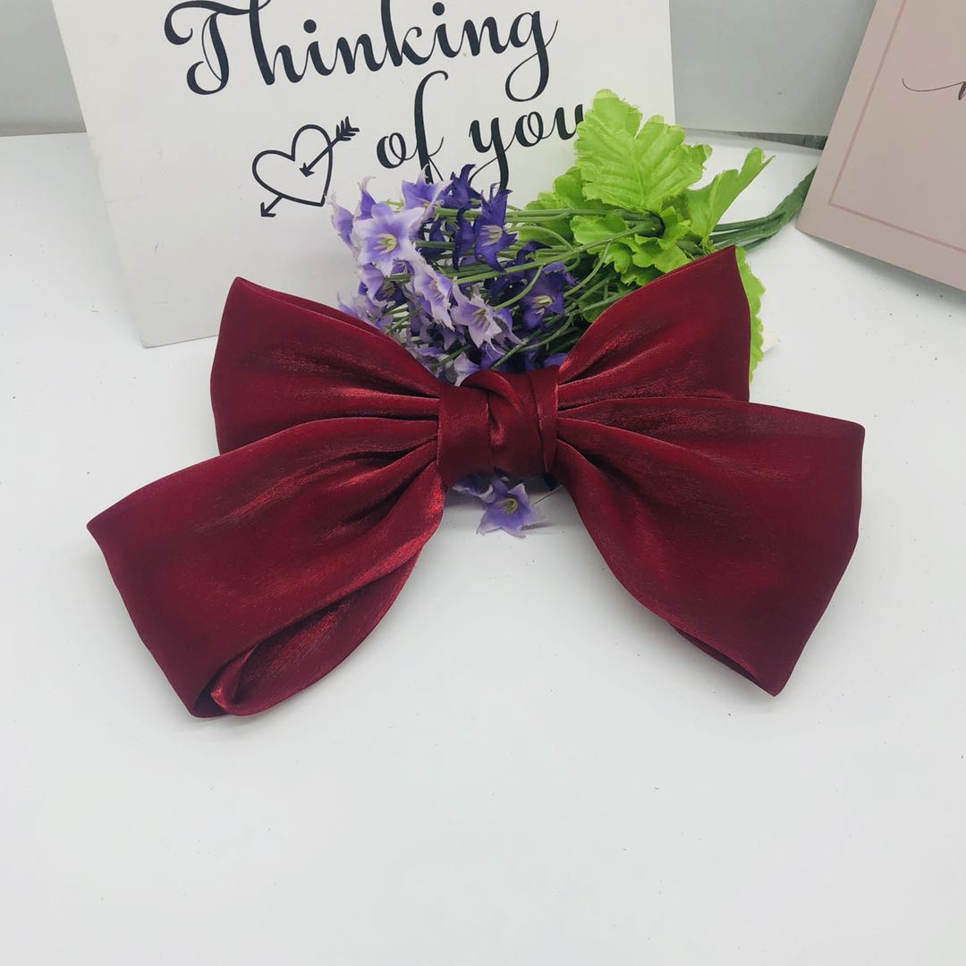 Hot fresh girls all match solid color spring clip pearl headdress summer new super fairy bright silk bow hair clip Item Picture