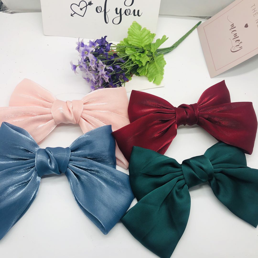 Hot fresh girls all match solid color spring clip pearl headdress summer new super fairy bright silk bow hair clip full figure