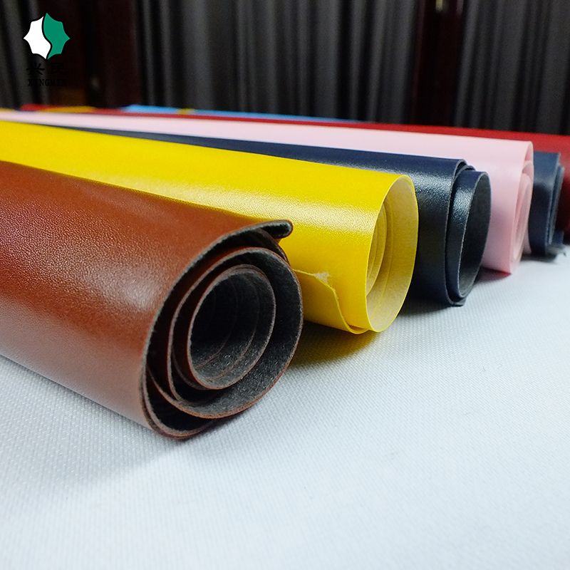 PVC artificial leather spunlace fabric base leather processing leather stationery handbag trademark shoe label eyeglass case fabric leather customization