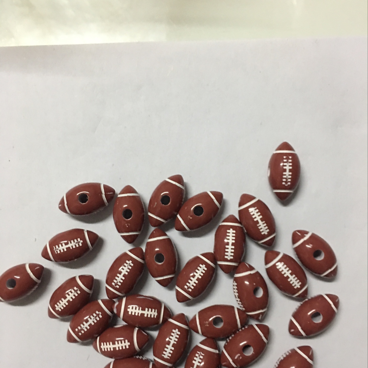 Acrylic central hole rugby ball thumbnail