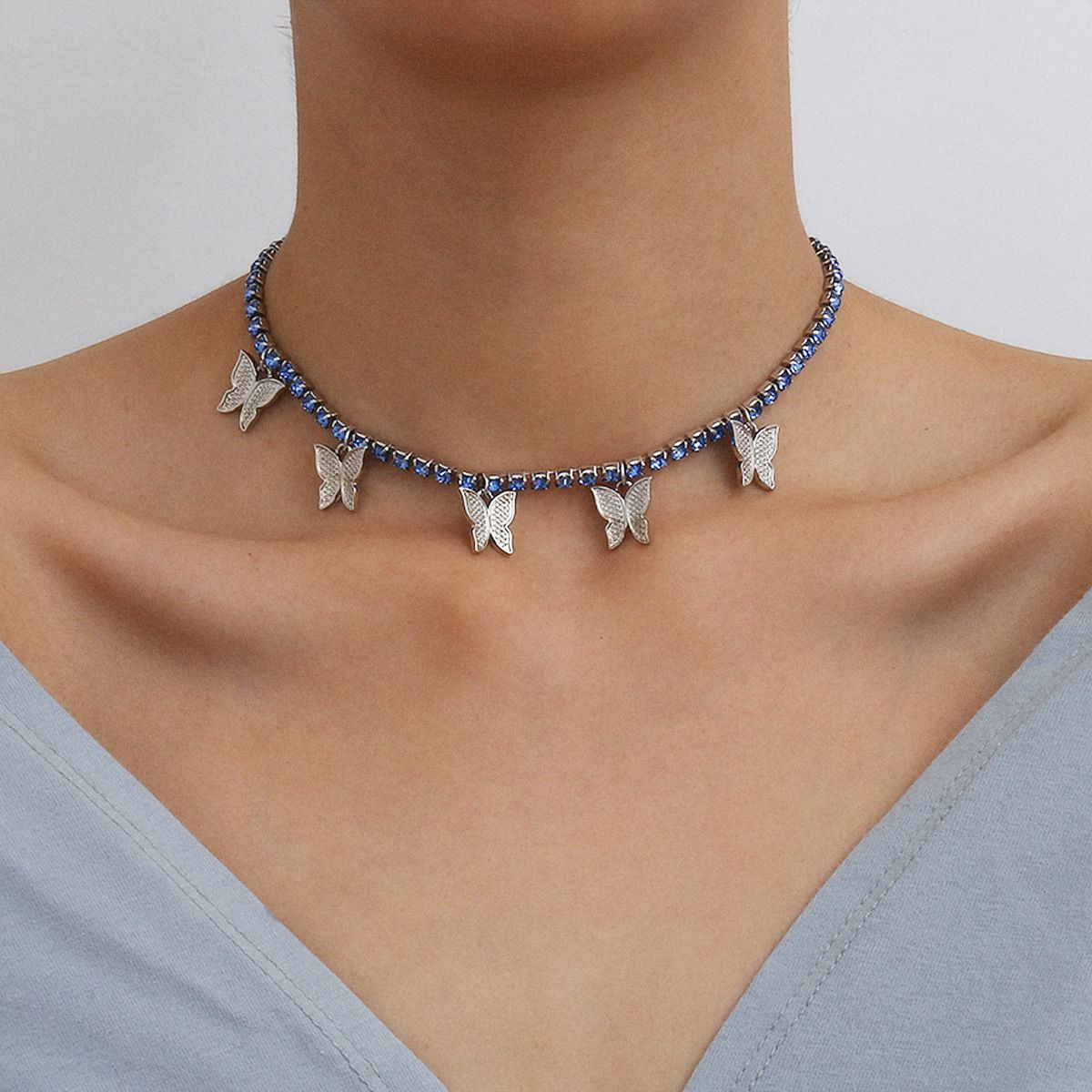 إن سلاسل الترالترقوة الريحية العابرة للحدود بين أوروبا والولايات المتحدة عبارة عن قلادة من الفراشات ذات طبقة واحدة detail image 14