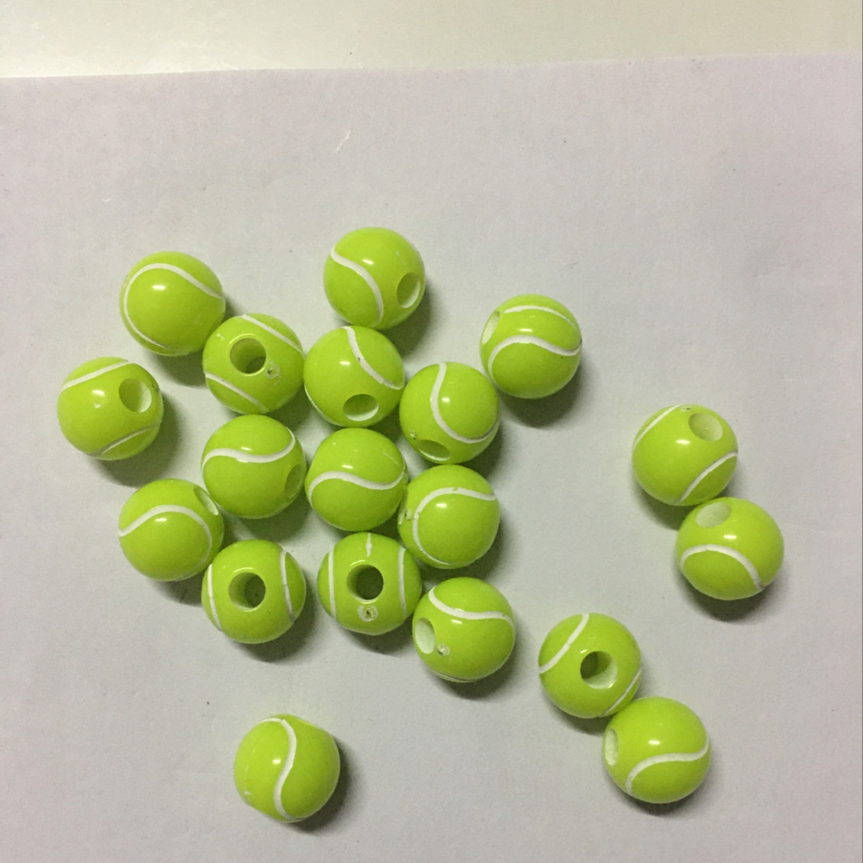 Acrylic fluorescent tennis balls