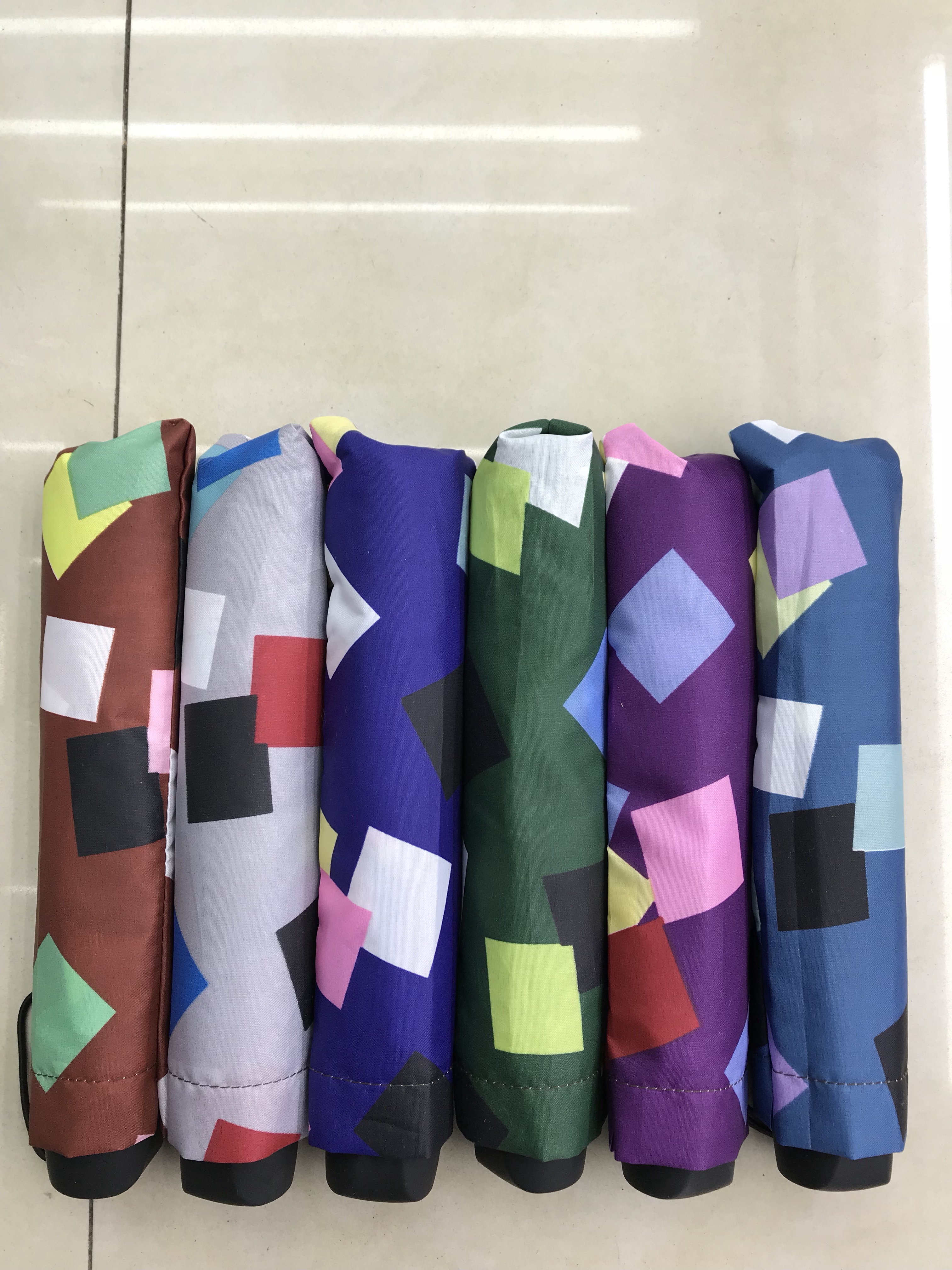 New three-fold umbrellas, parasols, sunshades and sun umbrellas details Picture
