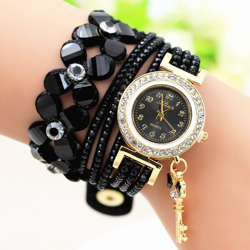 The new Amazon AliExpress hot-selling watch features a long band with three laps of water diamonds and is a fashionable and decorated women's watch details Picture