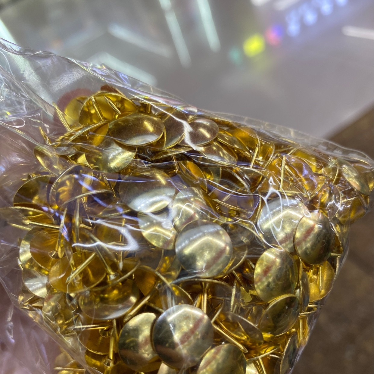 Golden thumbtack