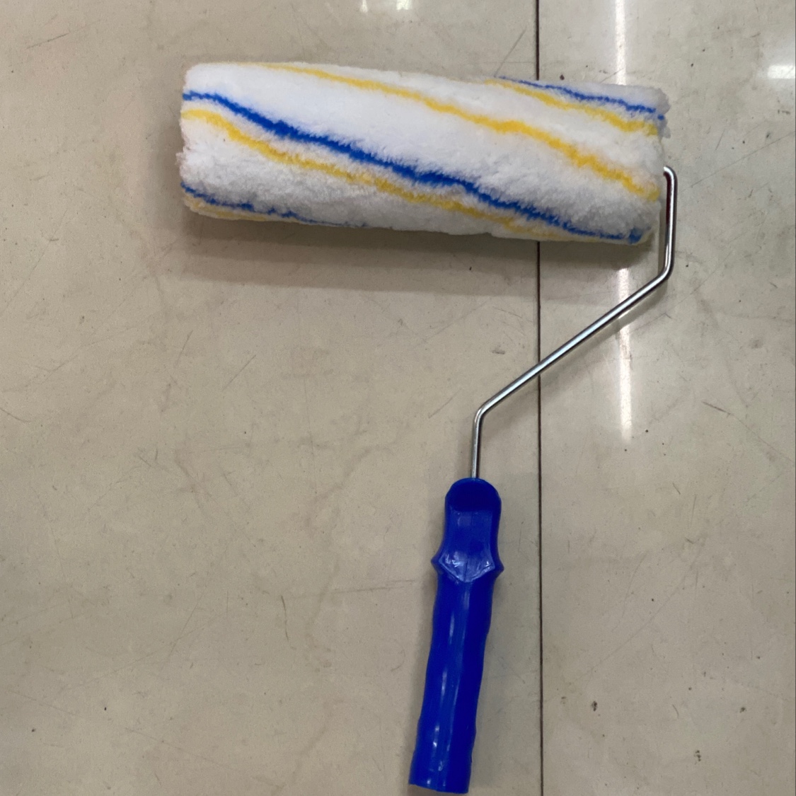 Blue and yellow striped roller