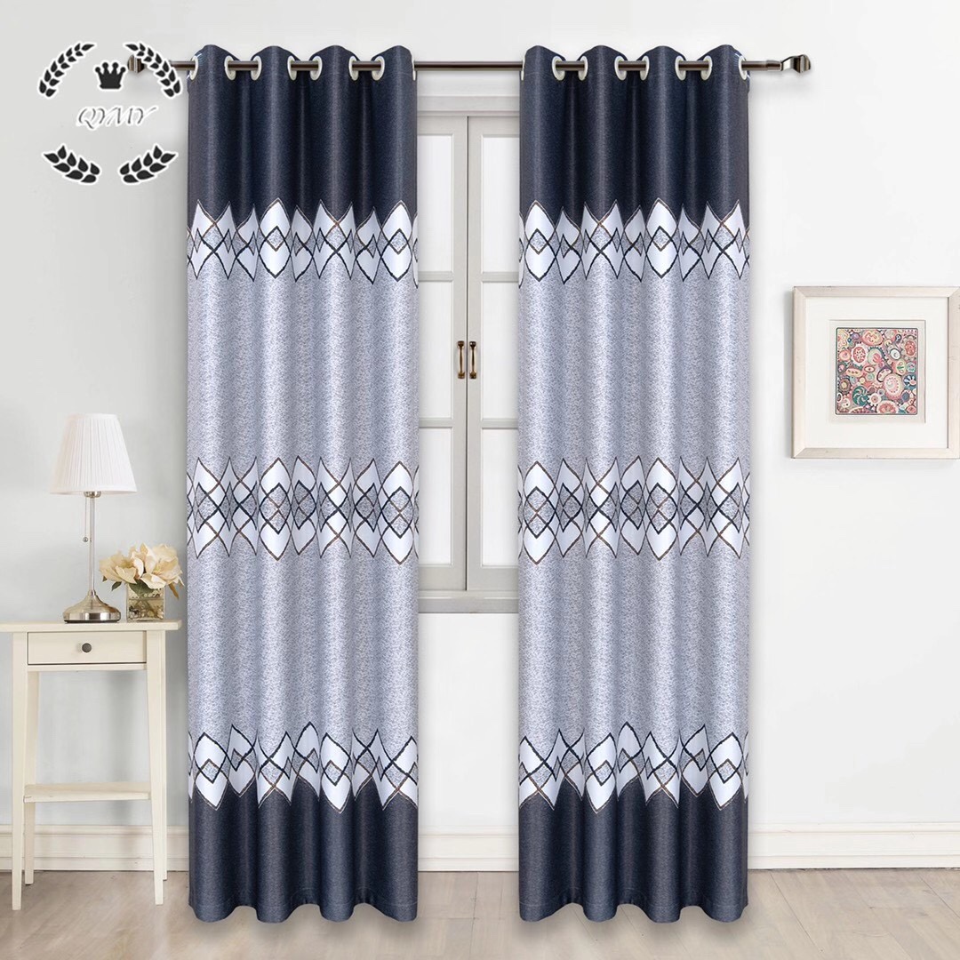 The curtain is black and colored to block out the light