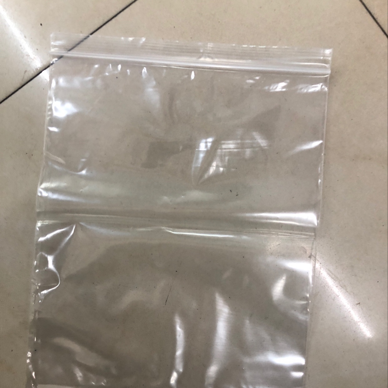 White edge self-sealing bag