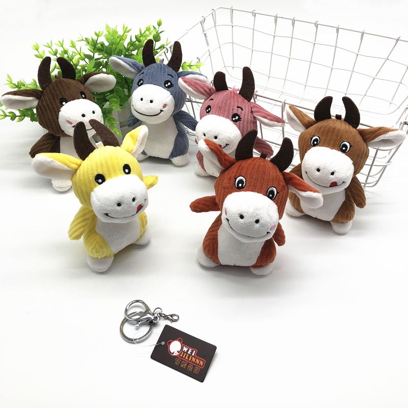 Original and creative cute cow plush toy key chain Calf pendant children's schoolbag hanging ornaments fine figures