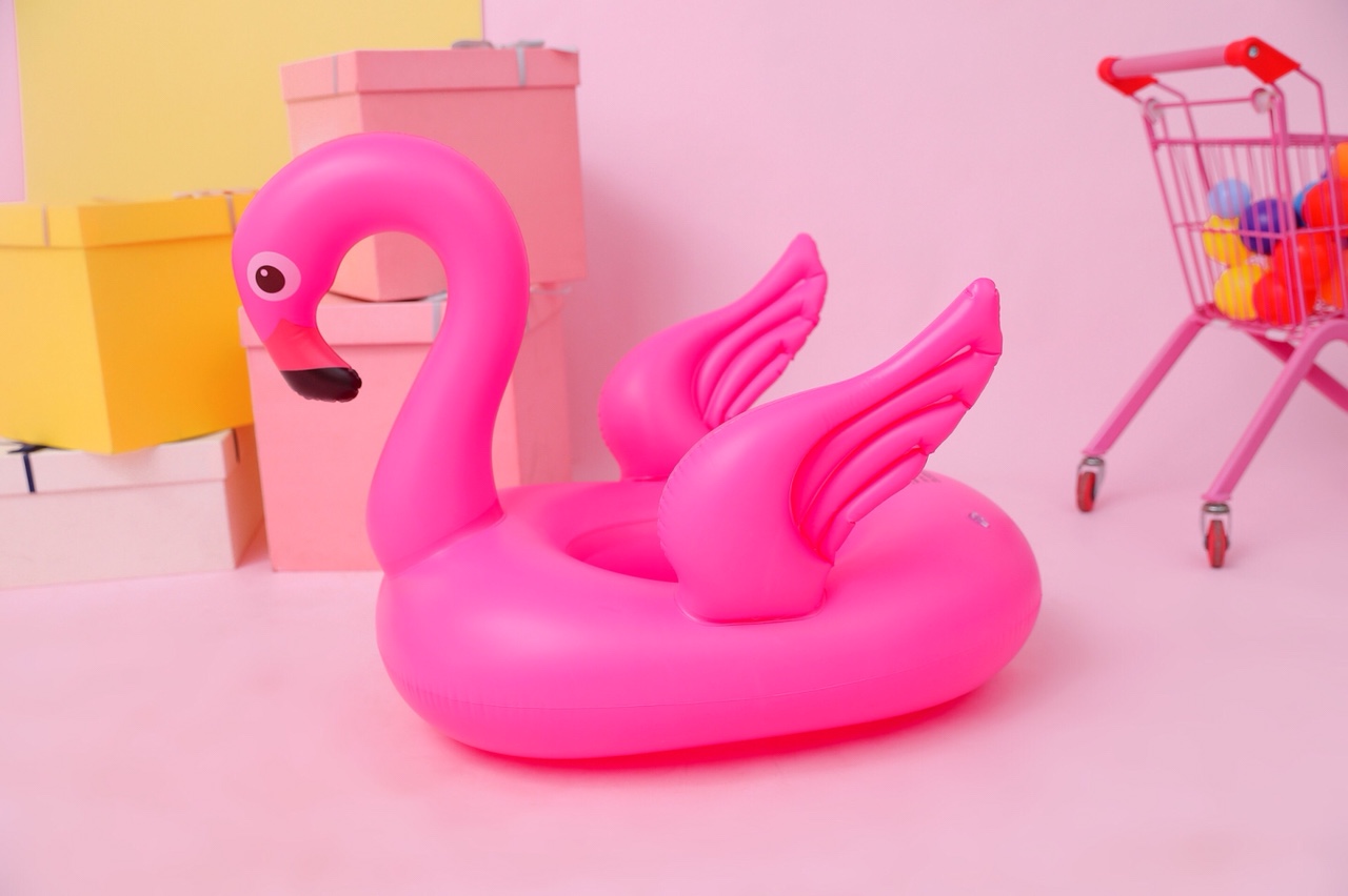 Flamingos and unicorns are on boats