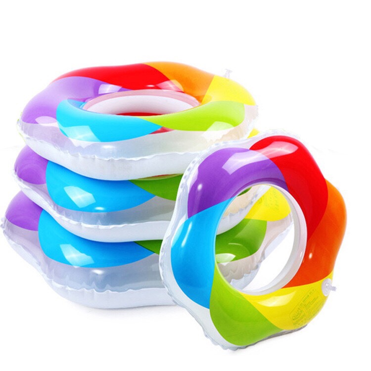 Colorful swimming rings detail image 1
