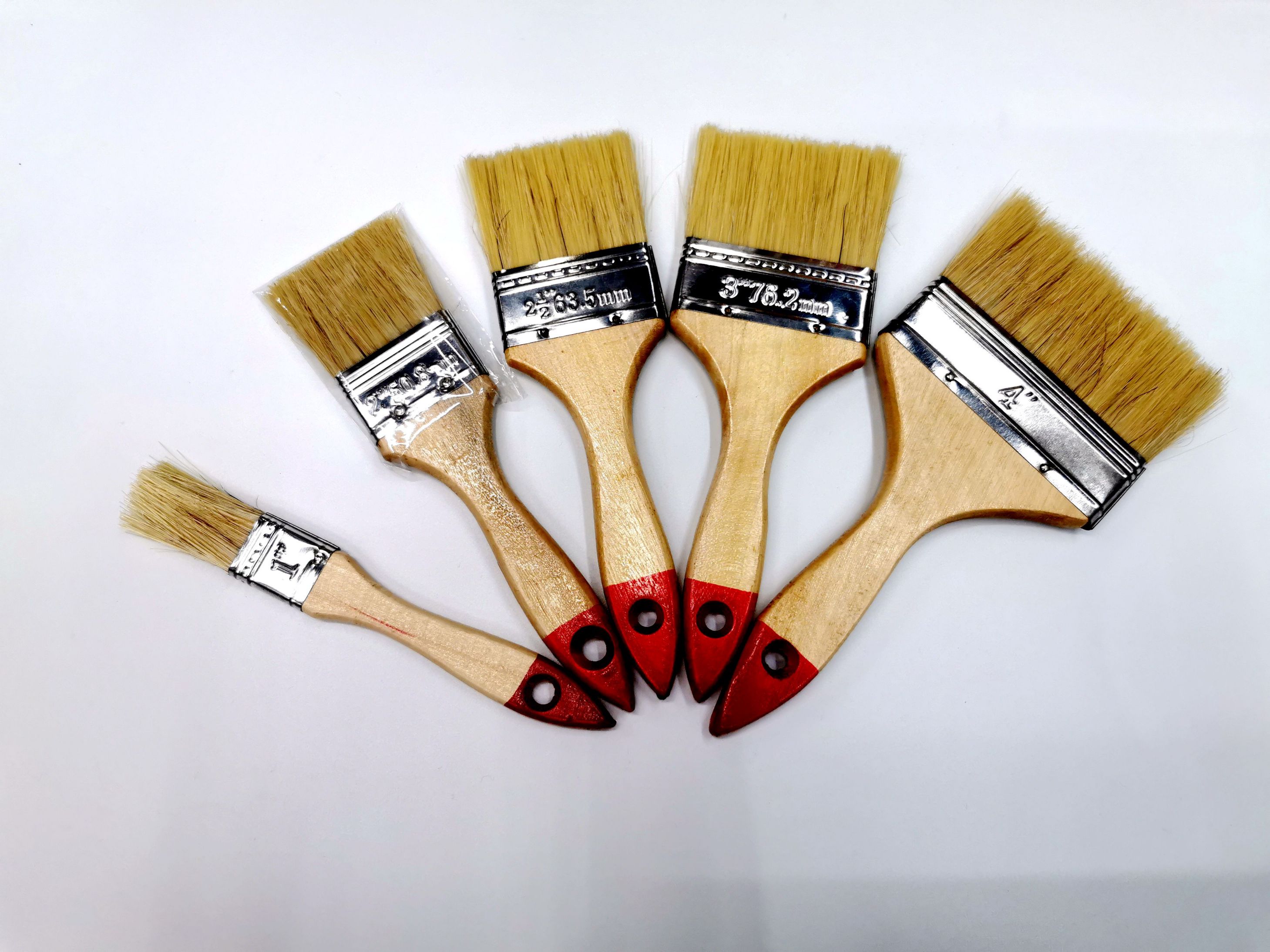 633# Paint brush with wood handle and red tail paint