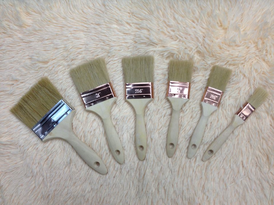 Paint brush with white wooden handle roller tools hardware