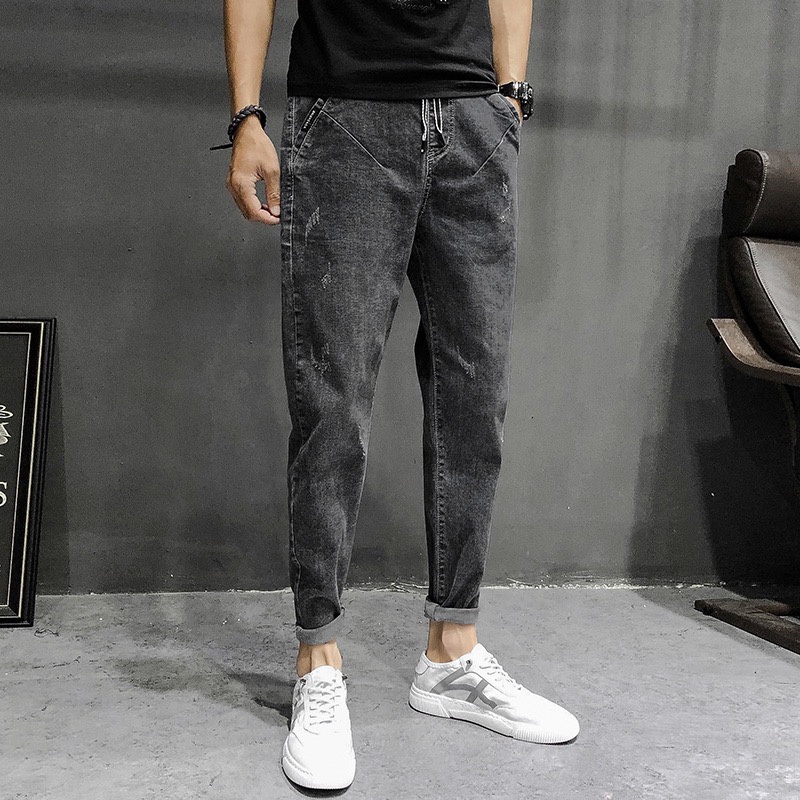 2020 autumn new jeans men's fashion brand long pants men Korean version of the trend slim fit all sports small feet pants