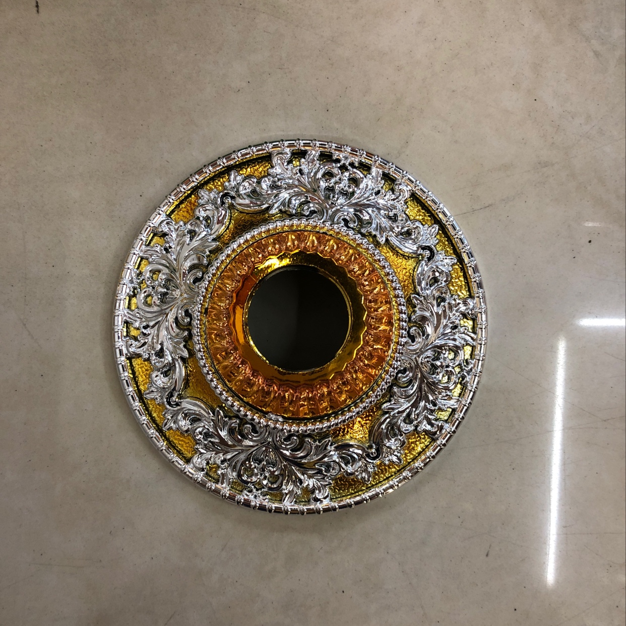 The lamp holder is gold and silver thumbnail