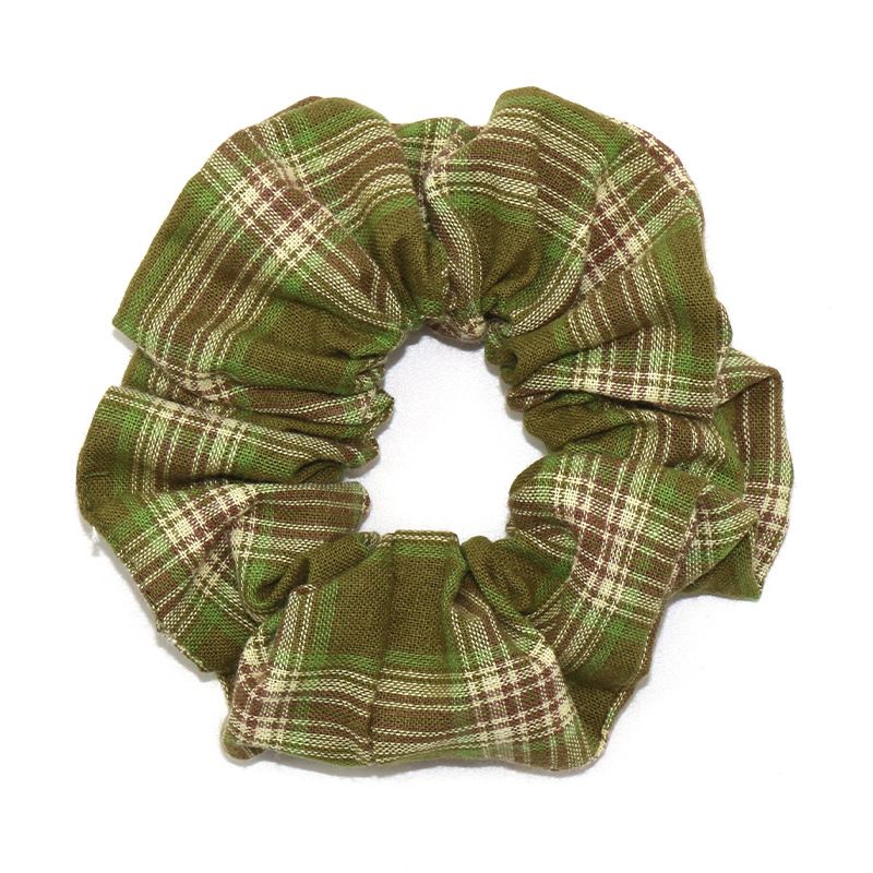 Fashionable Korean-style large intestine hair band, classic checkered leather band headwear, ladies' hair accessory, large intestine hair band wholesale Application Scenario