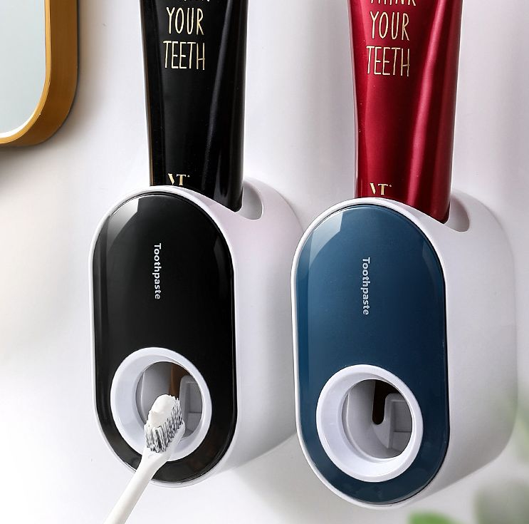 2020 Tiktok Pop automatic Toothpaste squeezer Mirror perforation-free toothbrush holder Lazy people squeeze toothpaste