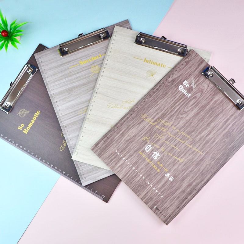 Wholesale of fashionable wood-grain cardboard clips, business board clips and student A4 writing boards in stock detail image 9