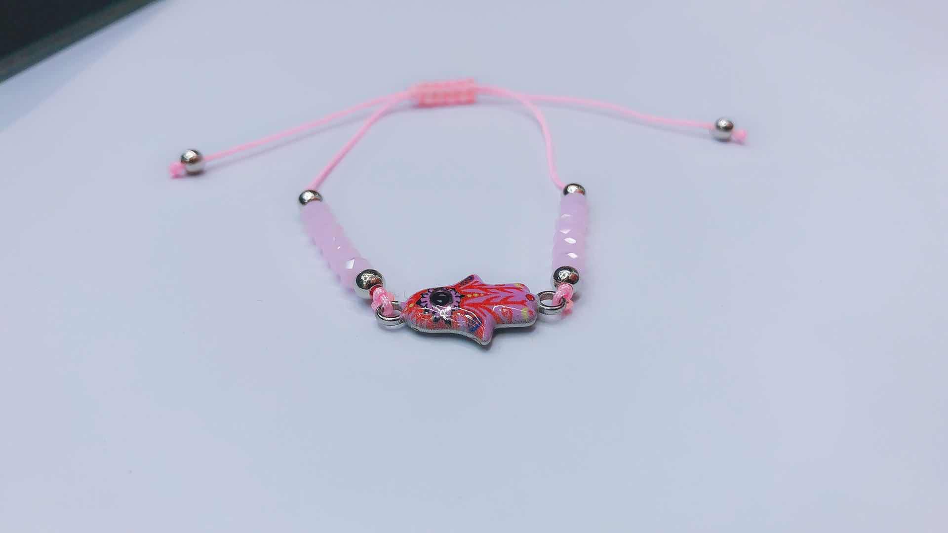 A crystal knotted middle palm alloy oil-dripping bracelet Specification image