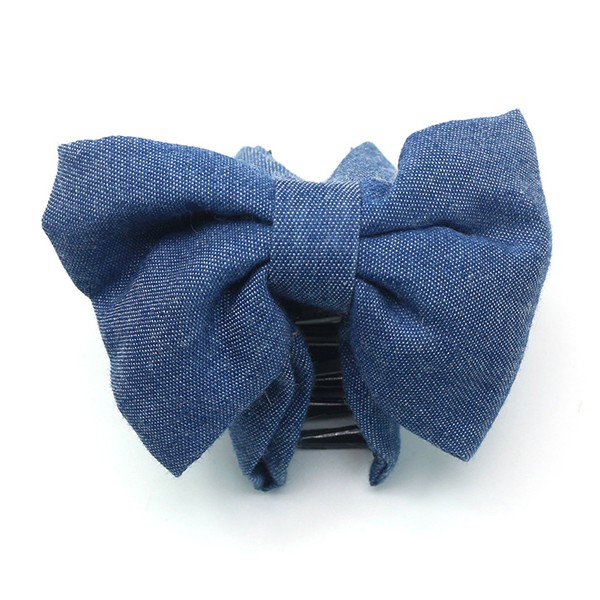 A new Korean-style women's fashionable and simple fabric bow grab clip that is versatile for daily use and a retro Korean-style hair clip accessory detail image 4