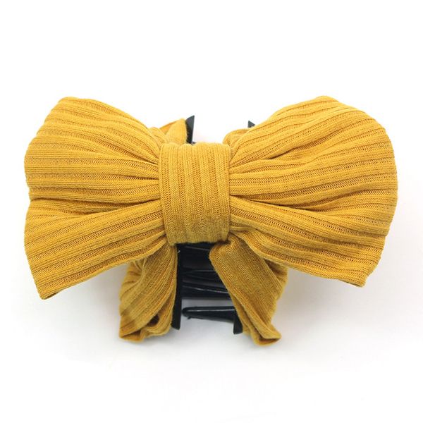 A new Korean-style women's fashionable and simple fabric bow grab clip that is versatile for daily use and a retro Korean-style hair clip accessory details Picture