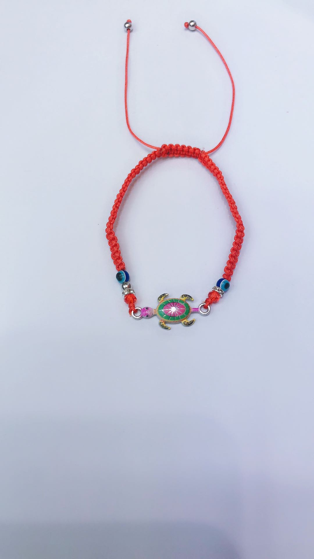 One Eye On Each Side Of A Flat Knot Bracelet. The Ccb. Crystals. Intermediate Alloy Tortoise full figure