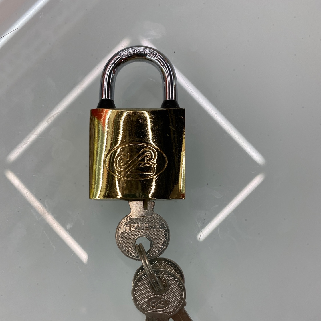 32# arc-shaped titanium lock
