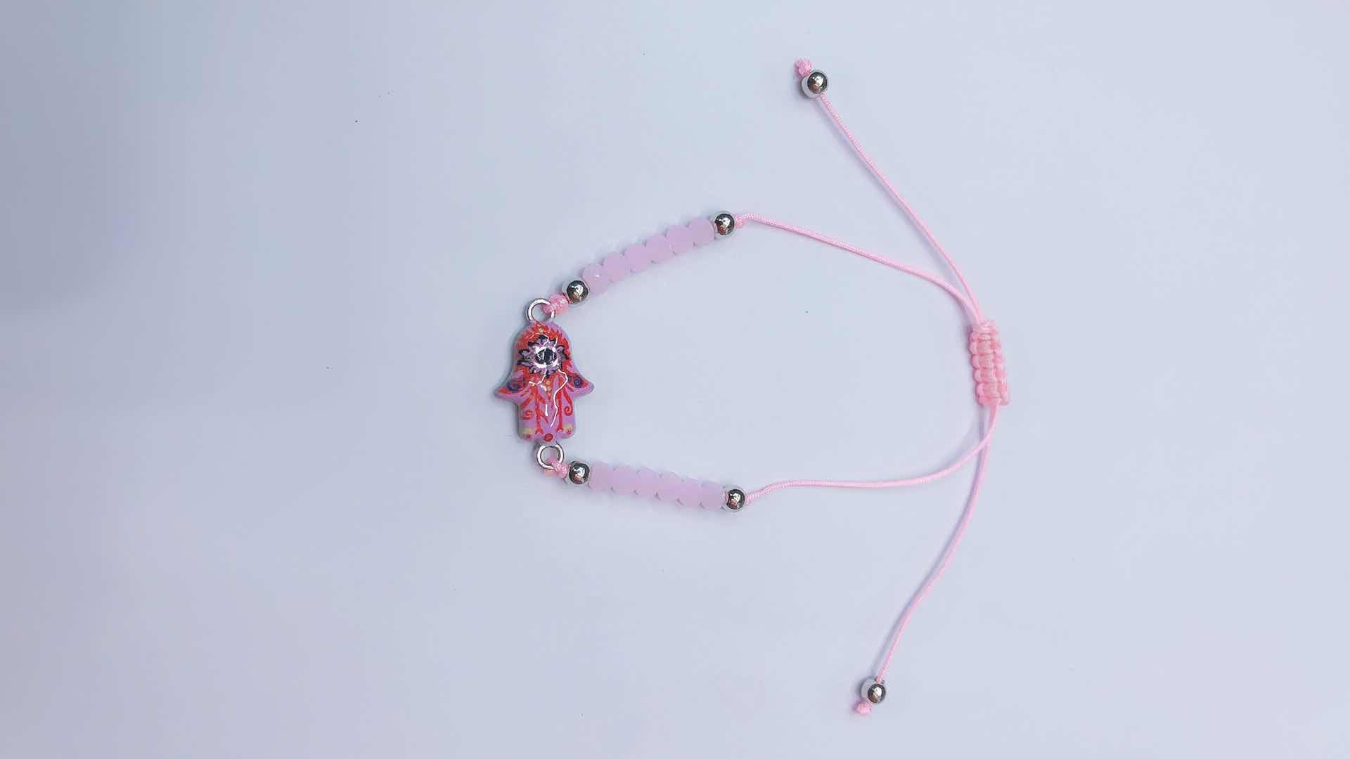 A crystal knotted middle palm alloy oil-dripping bracelet Item Picture