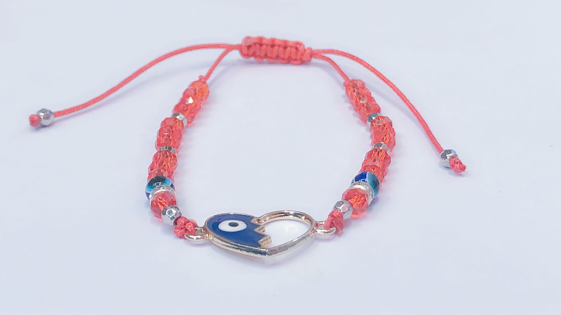 Wear the crystal double pendant accessory heart-shaped eyes, five-pointed star eyes, oval eyes bracelet with a flat knot at the middle end Item Picture