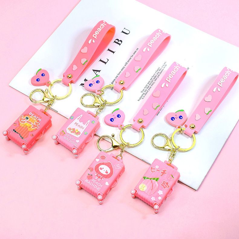 Peach/Shiba Inu suitcase keychain, creative and personalized, fashionable and cute bag pendant for Japanese and Korean men and women, mini Application Scenario