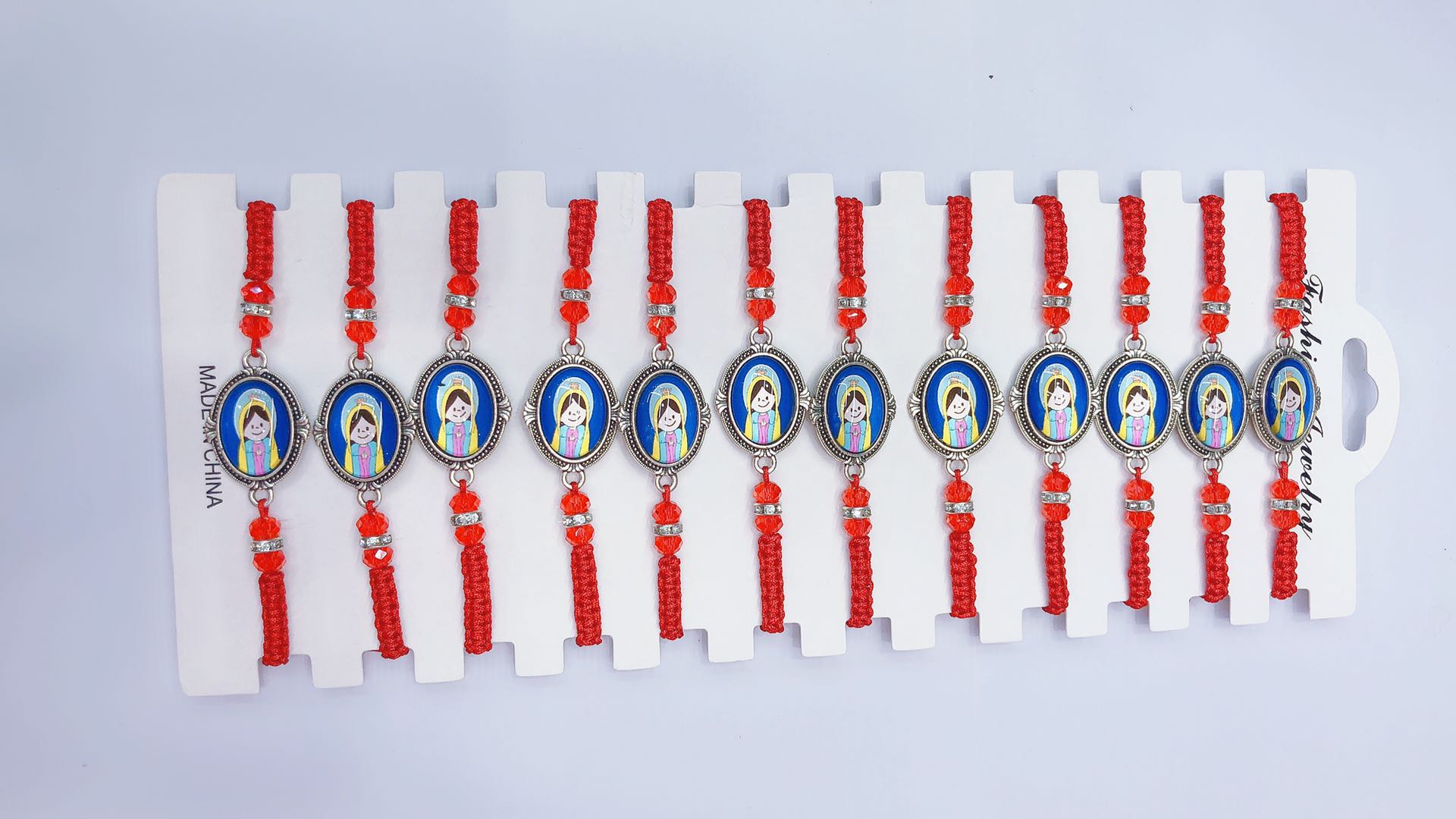 The plain knot woven bracelet with intermediate alloy accessories and religious patterns can be customized in both adult and children's sizes