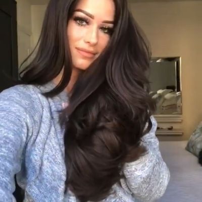 The new wig for women in Europe and America features a long, middle-parted curly hair that is naturally black and fluffy Specification image