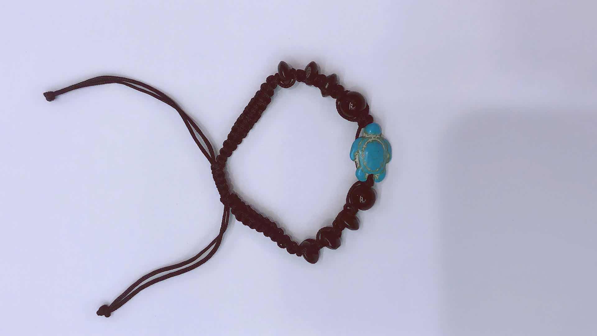 Plain knot woven bracelet 4x8 abacus beads, glass beads and turquoise turtle details Picture