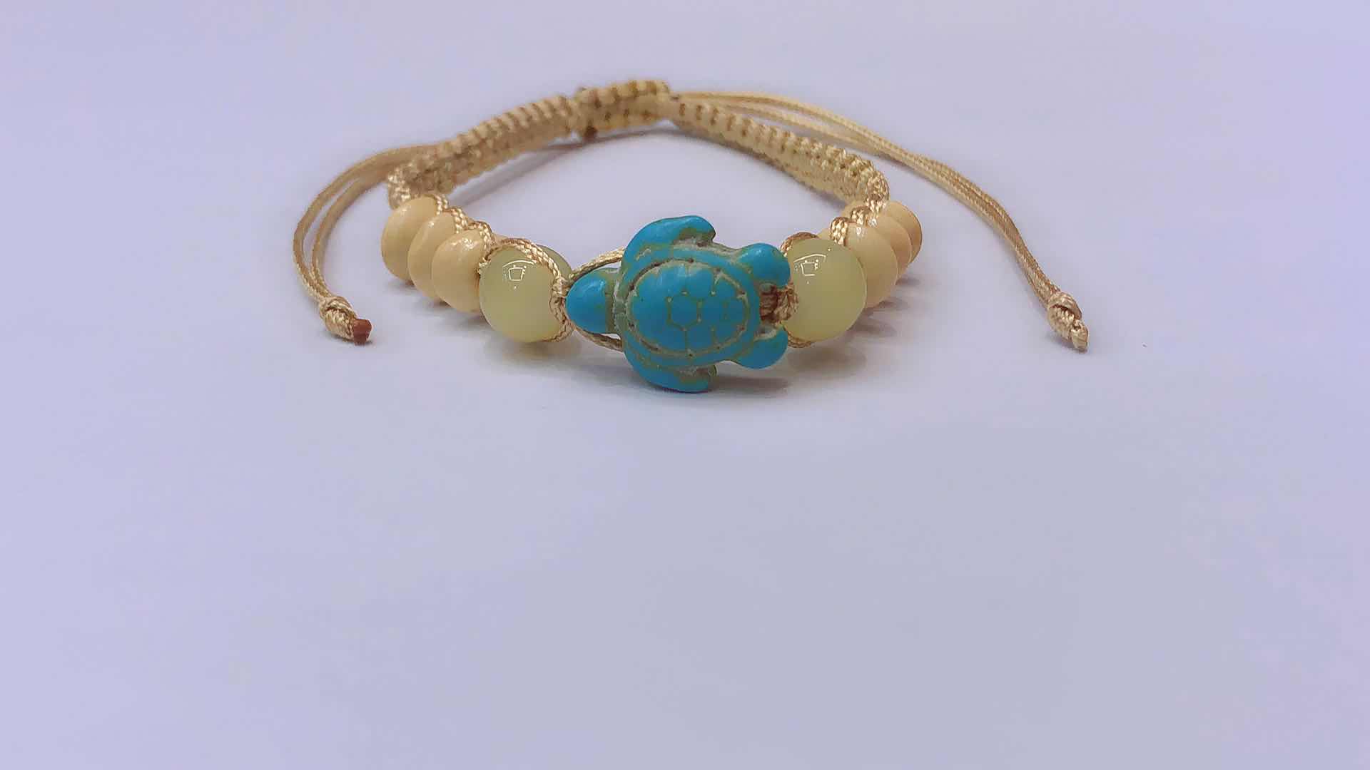 Plain knot woven bracelet 4x8 abacus beads, glass beads and turquoise turtle Item Picture