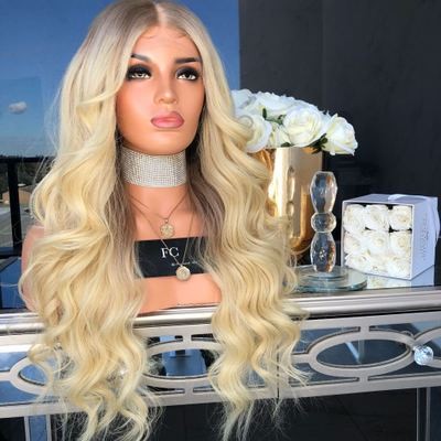 The new wig is made of chemical fiber for European and American women. It features golden yellow mid-parted long curls and slightly curly long straight hair detail image 2