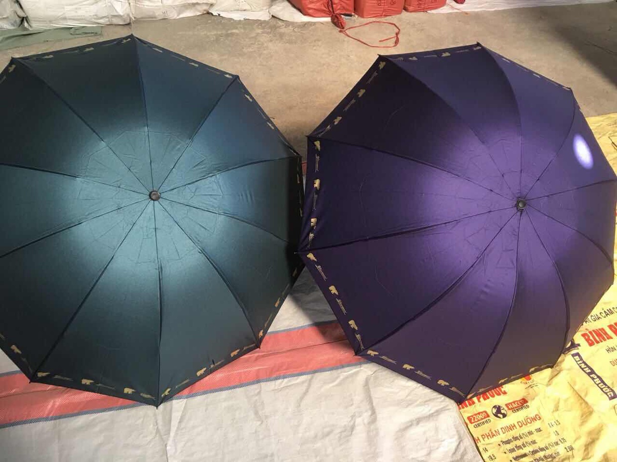 65 Three-section colored plastic umbrella