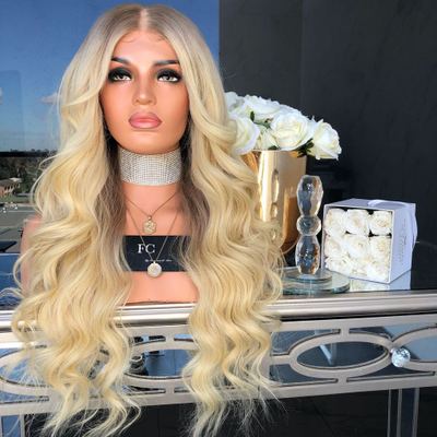 The new wig is made of chemical fiber for European and American women. It features golden yellow mid-parted long curls and slightly curly long straight hair
