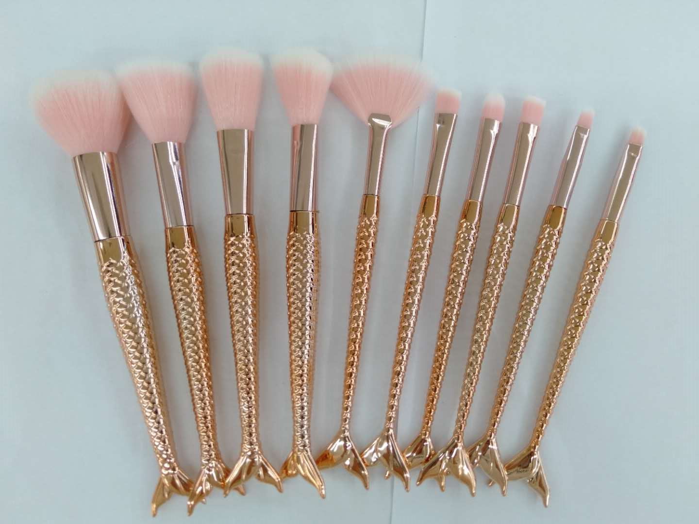 Set of makeup tools: eyeshadow brush, blush brush, eyebrow brush, and loose brush details Picture